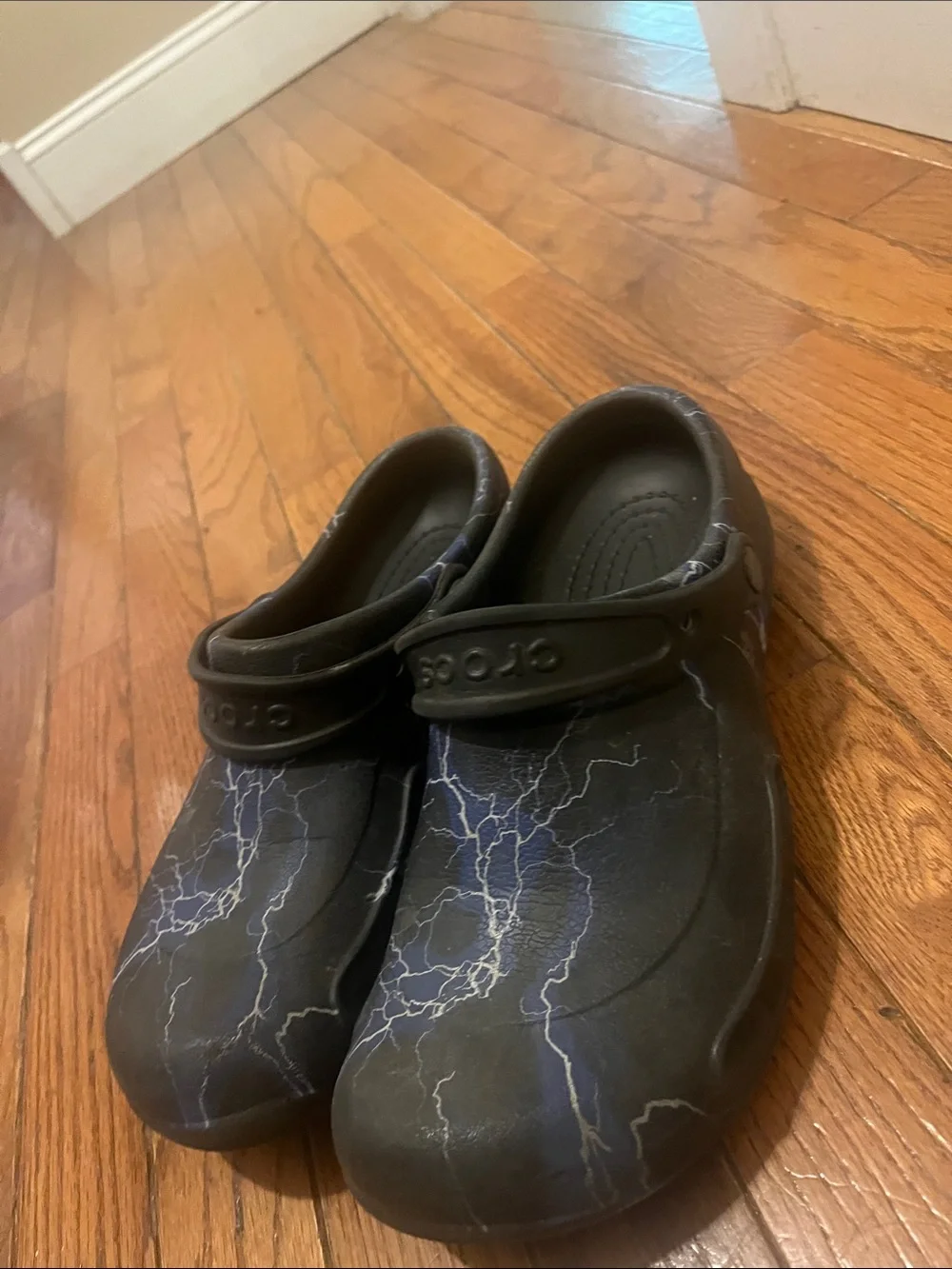 CROCS Kids Black Clogs with Blue and White Lightning Print